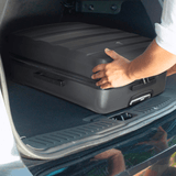 Aerolite suitcase being placed in car boot