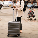 Woman with Aerolite suitcase in urban setting
