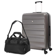 Person packing Aerolite suitcase on bed