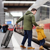 Man with child and Aerolite suitcase at train station