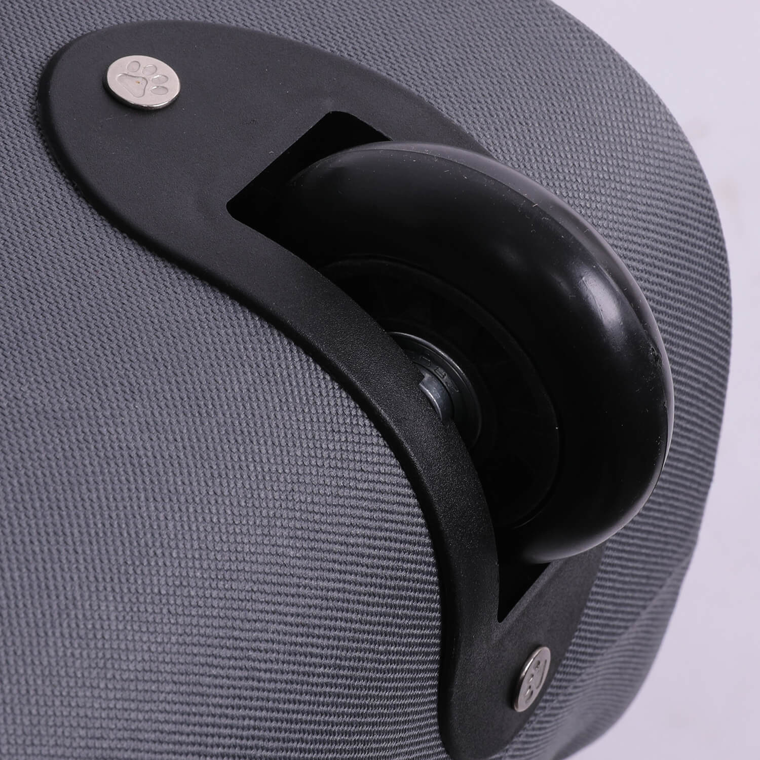 Close-up of Aerolite MiniMAX suitcase wheel, highlighting its durable and smooth-rolling design for travel.